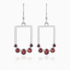 Verdant Currents Swirl Beneath Earrings