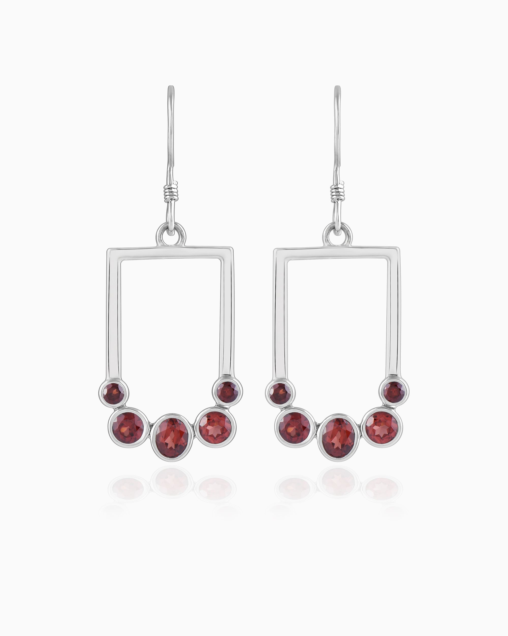 Verdant Currents Swirl Beneath Earrings