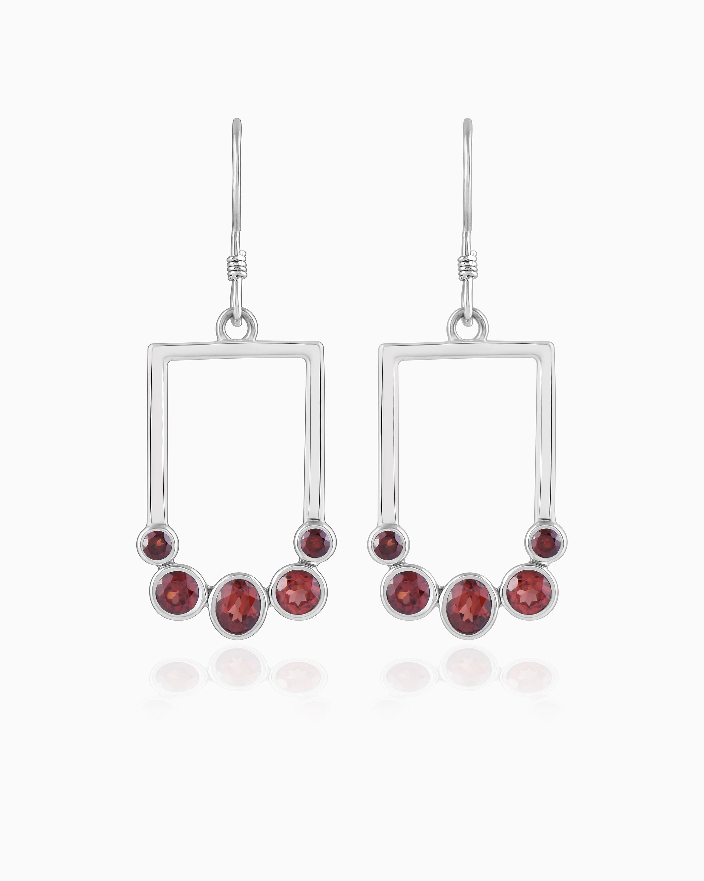 Verdant Currents Swirl Beneath Earrings