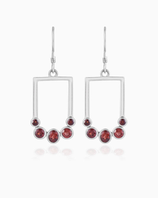Verdant Currents Swirl Beneath Earrings