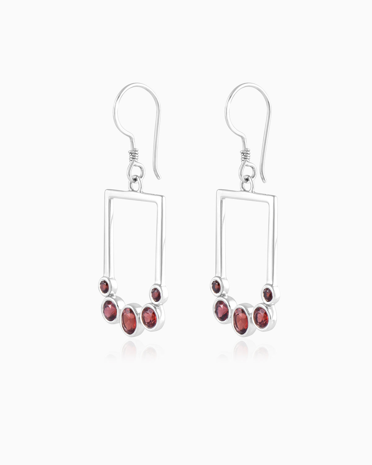 Verdant Currents Swirl Beneath Earrings