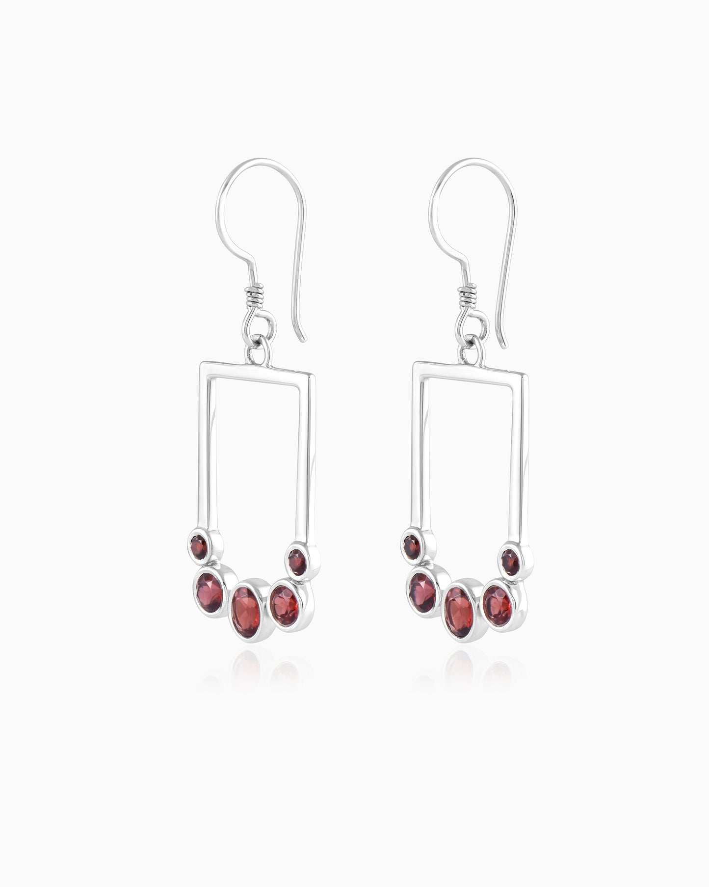 Verdant Currents Swirl Beneath Earrings