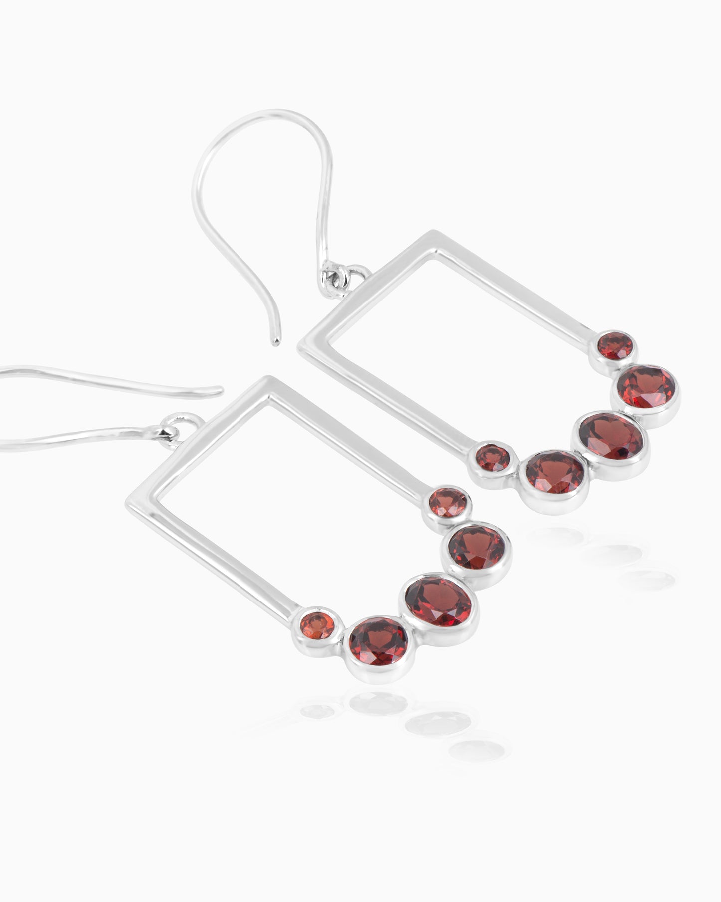 Verdant Currents Swirl Beneath Earrings