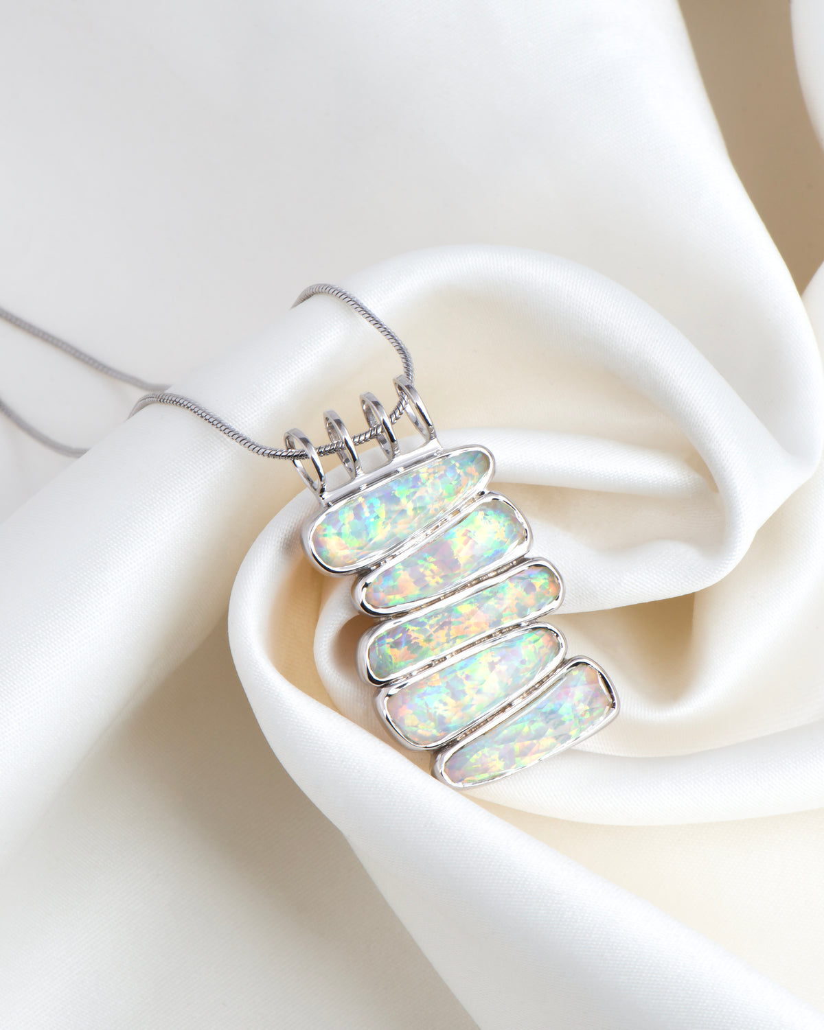 Stacked Opalescent pebbels Pendant