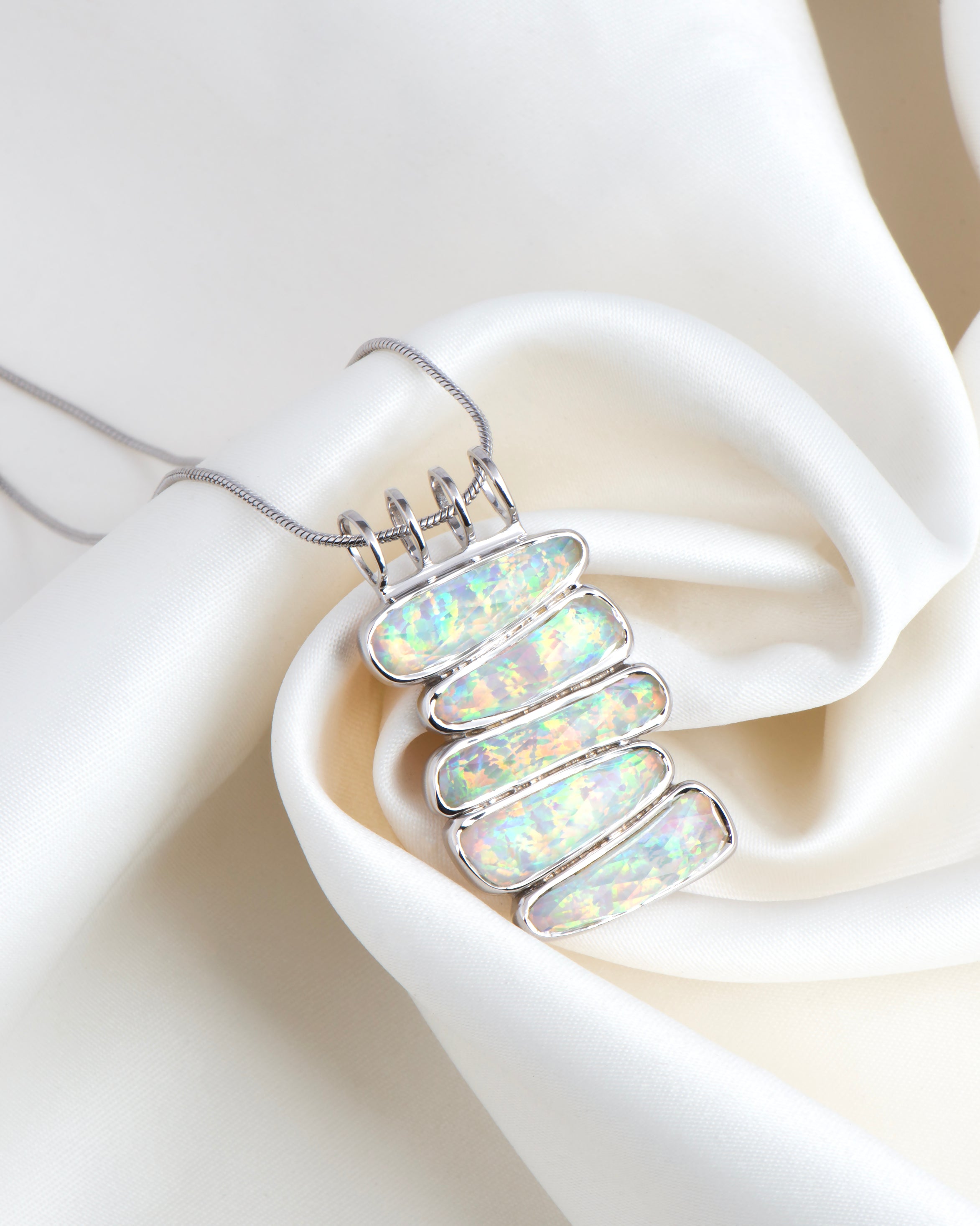 Stacked Opalescent pebbels Pendant